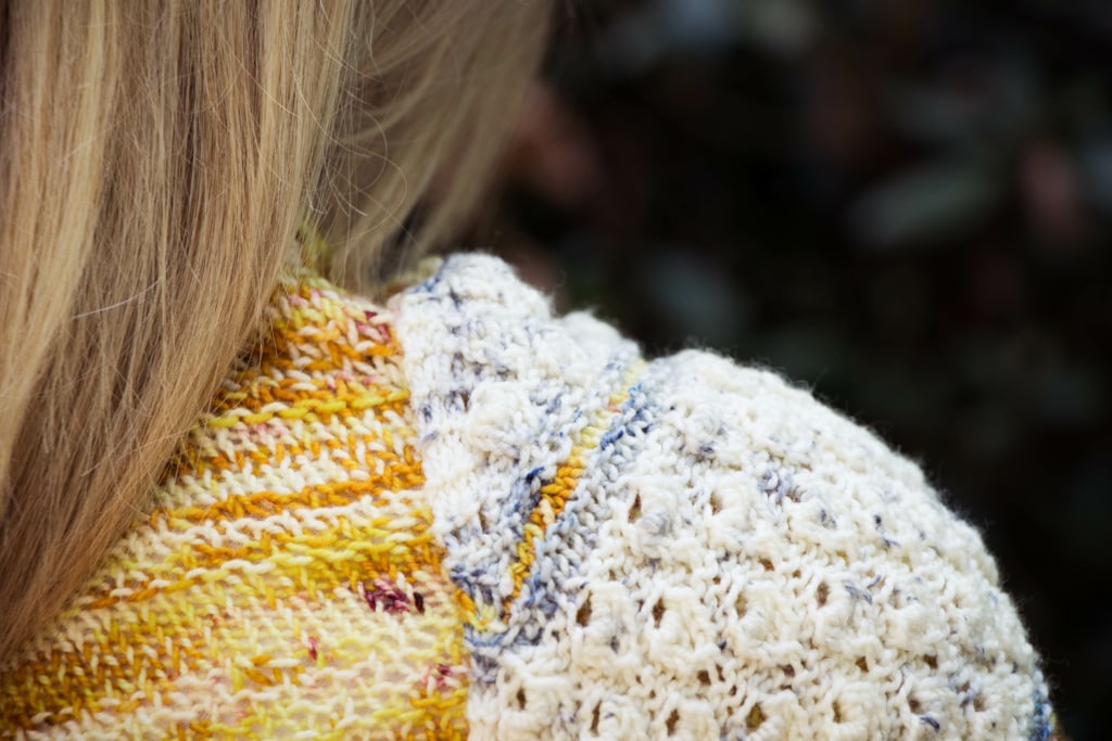 Hand-knit shawl shoulder detail
